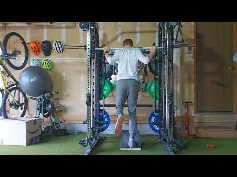 Single Leg Calf Isometrics Using a Smith Machine & Incline Board - Become a Better Runner