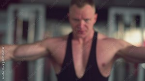 Workout. Strong man using a cross cable training machine in gym. Focus on hands. Fitness lifestyle Stock Video