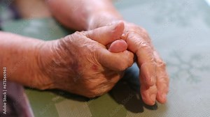 Aging process - very old senior woman hands wrinkled skin Stock Video