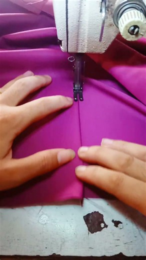 Learn to sew shoulder pads on the back of a shirt. #sewing #shorts