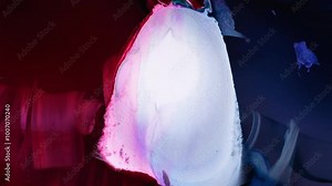 Abstract light display with swirling colors at an art event in a darkened space during the evening Stock Video