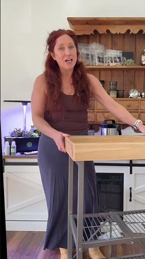 Butcher block kitchen island with foldable cart design for a farmhouse kitchen or cottage kitchen,