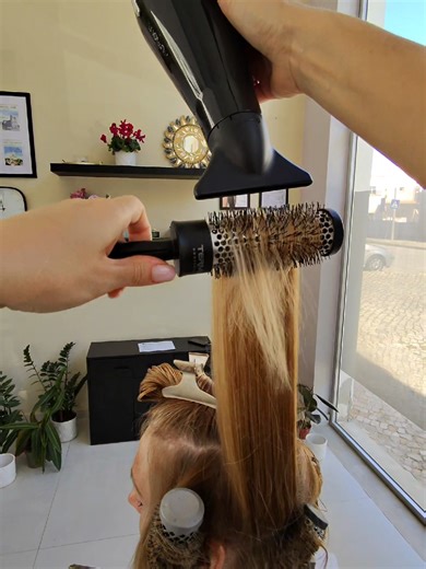 Achieve Light Curls with a Round Brush