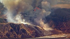 Wildfire on border of Riverside and Orange counties forces evacuations