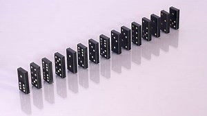 clip-21864436-black-domino-blocks-fall-sequence-after-one
