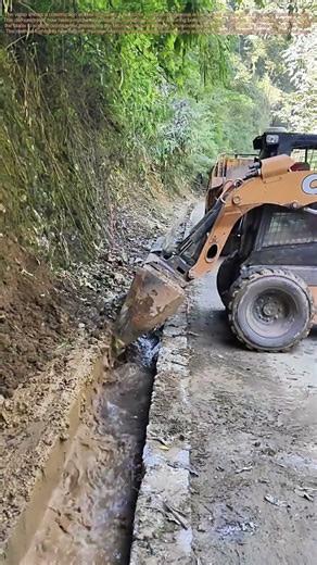 Drain Cleaning Duty: Bulldozer Clears Roadside Ditches in Minutes