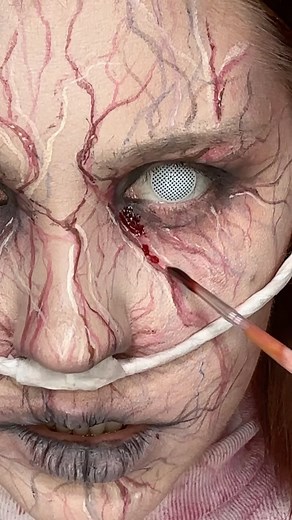 Valeriya on Instagram: "Easy infected makeup 🧫💉 Such a fun and easy look!! Using @mehronmakeup #makeup #makeuptutorial #halloween #halloweenmakeup #reels"