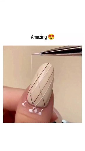 Teach You Funfact | The video showcases a meticulous grid-pattern nail art tutorial, applying thin white lines with tweezers and brushes on a nude base,... | Instagram