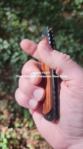 Coast FX411 Steel Liner-Lock with Chinesium Steel Alloy Blade and Stabilized Wood Scales