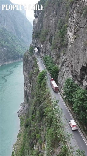 421K views · 2.4K reactions | Could you imagine driving on this road built on cliffs by the Wujiang River in southwest China's Chongqing? It is even a piece of work for experienced drivers! #AmazingChina | People's Daily, China | Facebook