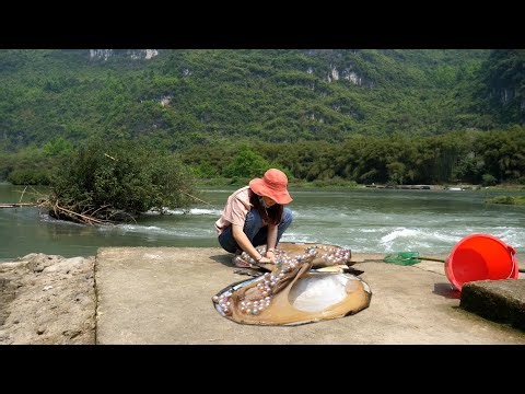 What a surprise! We found a giant river clam, and the pearl was just as big.