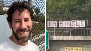 Man hangs up giant 'I'm single' sign on 101 Freeway