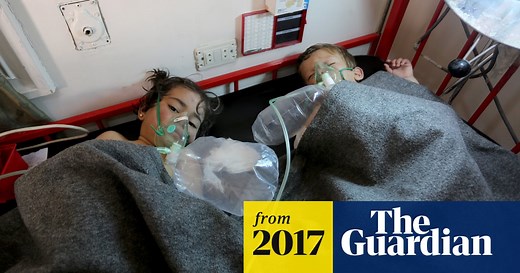 Dozens die in suspected chemical attack in Syria – video report