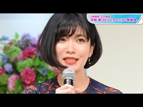 Kawakami Mieko wears a chic all-over print dress and high heels for a sophisticated look. She add...