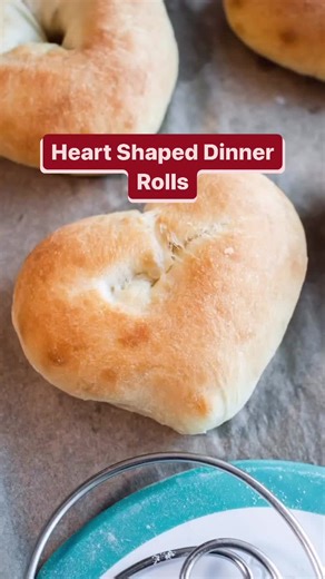 ♥️ Heart Shaped Dinner Rolls Servings: 6 rolls Ingredients: 💛 ¾ cups hot water 💛 ½ tablespoon active dry yeast 💛 1 tablespoon sugar 💛 1 tablespoons vegetable oil 💛 ½ teaspoon salt 💛 1 ¾ cups flour 💛 butter, for brushing, if desired Instructions: 1. In a bowl, mix together the water, yeast, and sugar. Let stand for 5 minutes, or until looks frothy. 2. Add the oil, salt, and 1 cup of flour. Mix until well combined. 3. Add the remaining flour 3/4 cup at a time. You want your dough to be slig