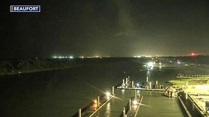 Live look at Carolina Beach as rain from Debby begins to hit NC coast