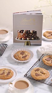 5.5K views · 172 reactions | Baked to perfection ✨ This chocolate and macadamia cookie is just one of many irresistible recipes from the Lindt Cookbook, now available at our London Piccadilly Flagship store. Indulgent, inspiring, and full of wow-factor desserts—discover your next signature bake. | Lindt | Facebook