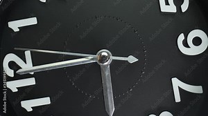 Zoom out macro shot of clock face with rapid rotation and almost static seconds arrow. Fast flow of time concept. Real watch shot with macro lens close-up view. 4k.