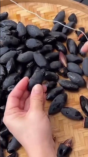 Removal process of black olive shell