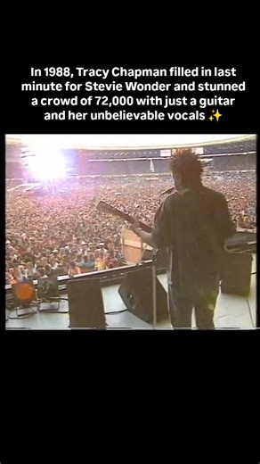 Basically Song's on Instagram: "Story Behind This : Tracy Chapman was forced to fill in at the Nelson Mandela 70th Birthday Tribute Concert held at Wembley Stadium in London on June 11, 1988. Stevie Wonder was scheduled to perform, but his synclavier's hard disk, containing all the synthesized music for his act, went missing during transport. Without this crucial equipment, Stevie Wonder declined to perform. Tracy Chapman, who had already performed a set earlier that day, was asked to fill in at