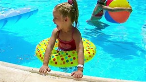 Children Sitting On Inflatable Ring Swimming Stock Footage Video (100% Royalty-free) 6322406 | Shutterstock