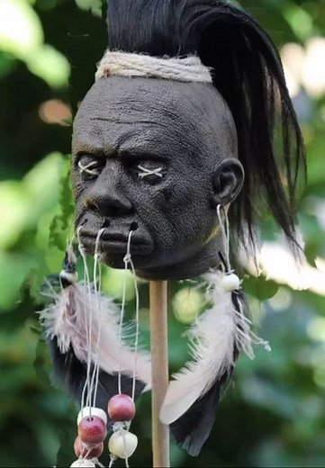 Shrunken Head in resin. The Shuar, an indigenous people of the Amazon rainforest in Ecuador and Peru, traditionally made shrunken heads, also known as tsantsas. These were created from the skin of deceased enemy warriors, with the head being shrunk to the size of a fist after removal and treatment. The Shuar believed that shrunken heads trapped the power of the slain warrior’s soul, which could then be harnessed and transferred to women for fertility and good crops. #shrunkenhead #tribal #odditi
