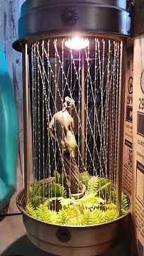 Vintage mineral oil lamp with goddess statue, dripping