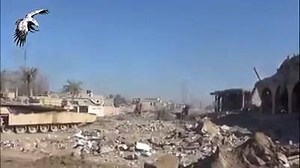 An ISIS car bomb is hit and destroyed by Iraqi M1 Abrams tank during liberation of center of Ramadi. http://www.tacticools.com/ | Military Leak