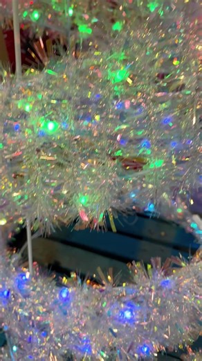 The Member's Mark 8' Pre-Lit Iridescent Spiral Tree adds a unique twist to traditional holiday décor with its captivating spiraling design. #SamsClubFinds #MembersMark | Sam's Club