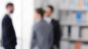 Confident woman smiling at camera after having an interview with a business team, success and employment concept