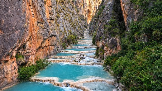 Why do these pools look like natural infinity pools?