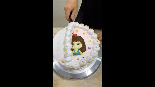 Decorating Round White Cake With Cute Girl In Reverse