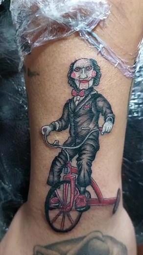 Detailed Tattoo of a Clown Character on Forearm