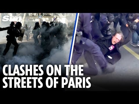 Riot cops fire tear gas at anti-austerity protesters as Paris descends into chaos AGAIN