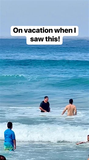 Filming the waves when I either saw a dolphin or a shark #dolphins #shark #vacationvibes #ocean | Liz & Jeff