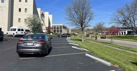Suspect turns himself in after shooting woman outside Springdale office building