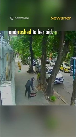 Woman Disappears Into Manhole While on Her Phone in Brazil 😱 #Shorts