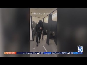 Restroom 'Peeping Tom' caught on video
