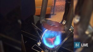 395K views · 1K reactions | Eleven Madison Park opens bottles of port wine using hot tongs. | Business Insider | Facebook