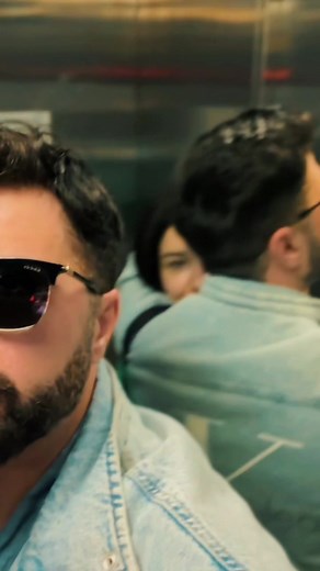 Affectionate Moments in an Elevator Setting