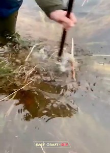 Unclogging 6 acre semi froze pond overflow pipe. Very tough task | Derrick X. Talks