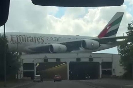 'Unreal' video shows giant aircraft landing just feet away from motorway