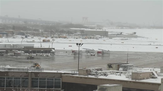 Crews work to clear snow from Philadelphia airport tarmac