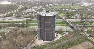The Gasometer, industrial monument and landmark in the city of Oberhausen, Germany. Musuem and touristic attraction. Aerial drone view. Birds eye view. Stock Video