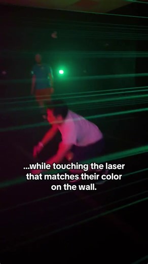 Having trouble spotting the lasers in Laser Relay? Use the wall to get a better view of the lasers you also need to avoid! #EnterTheGame #Activate #games #usa #canada #Gaming #Fitness #thingstodo #groupfun | Activate