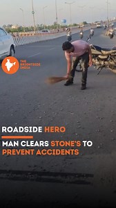 8.2K views · 651 reactions | Without being asked, a man stops his scooty to clear stones from the road — protecting strangers he’ll never meet. Silent acts like these keep humanity alive  . . . (kindness, responsibility, awareness, humanity, selflessness) | The Positive India | Facebook