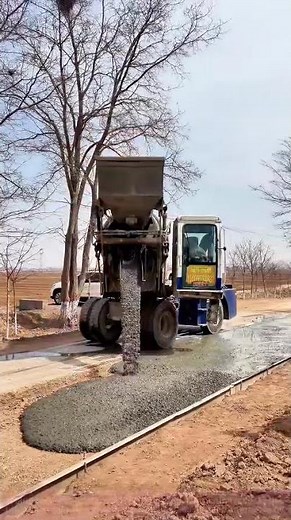 Concrete Mixer Truck Pouring Asphalt