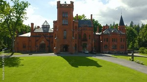 Beautiful medieval red Sangaste Castle (German: Schloss Sagnitz) and it's surroundings in country of Estonia.