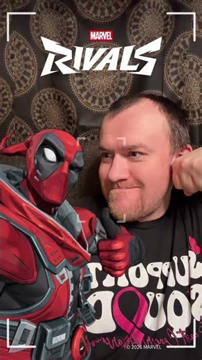 Posing with Deadpool.