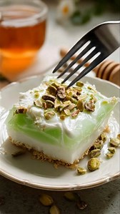 An incredibly simple and delicious homemade dessert that comes together in minutes. Perfect for any occasion and requires no cooking at all! 🍨 Creamy Pistachio Pudding 🍨 📝 Ingredients - 1 package instant pistachio pudding mix - 2 cups milk - 1 cup whipped cream - 1/2 cup crushed pistachios - 1 teaspoon vanilla extract 🥣 Steps to Make 1. In a large bowl, whisk together the instant pistachio pudding mix and milk until the mixture is completely smooth and free of lumps. 2. Carefully fold in the